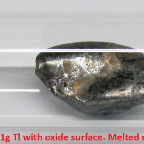 A Thallium - Tl - Thallium 4N 1g Tl with oxide surface. Melted metal sample..jpg